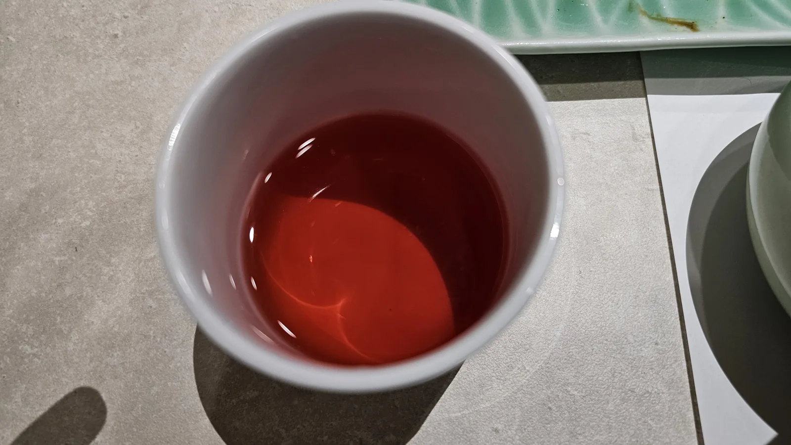 Omija five-flavor berry tea served chilled at the end of the meal at Daedong Jangeo