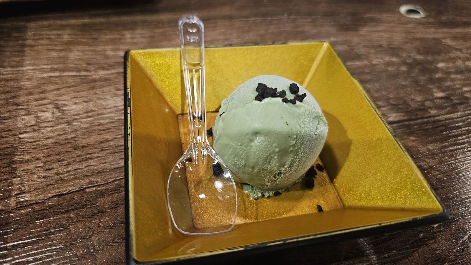 Green tea ice cream served on gold plate as dessert at GU.I Yeouido