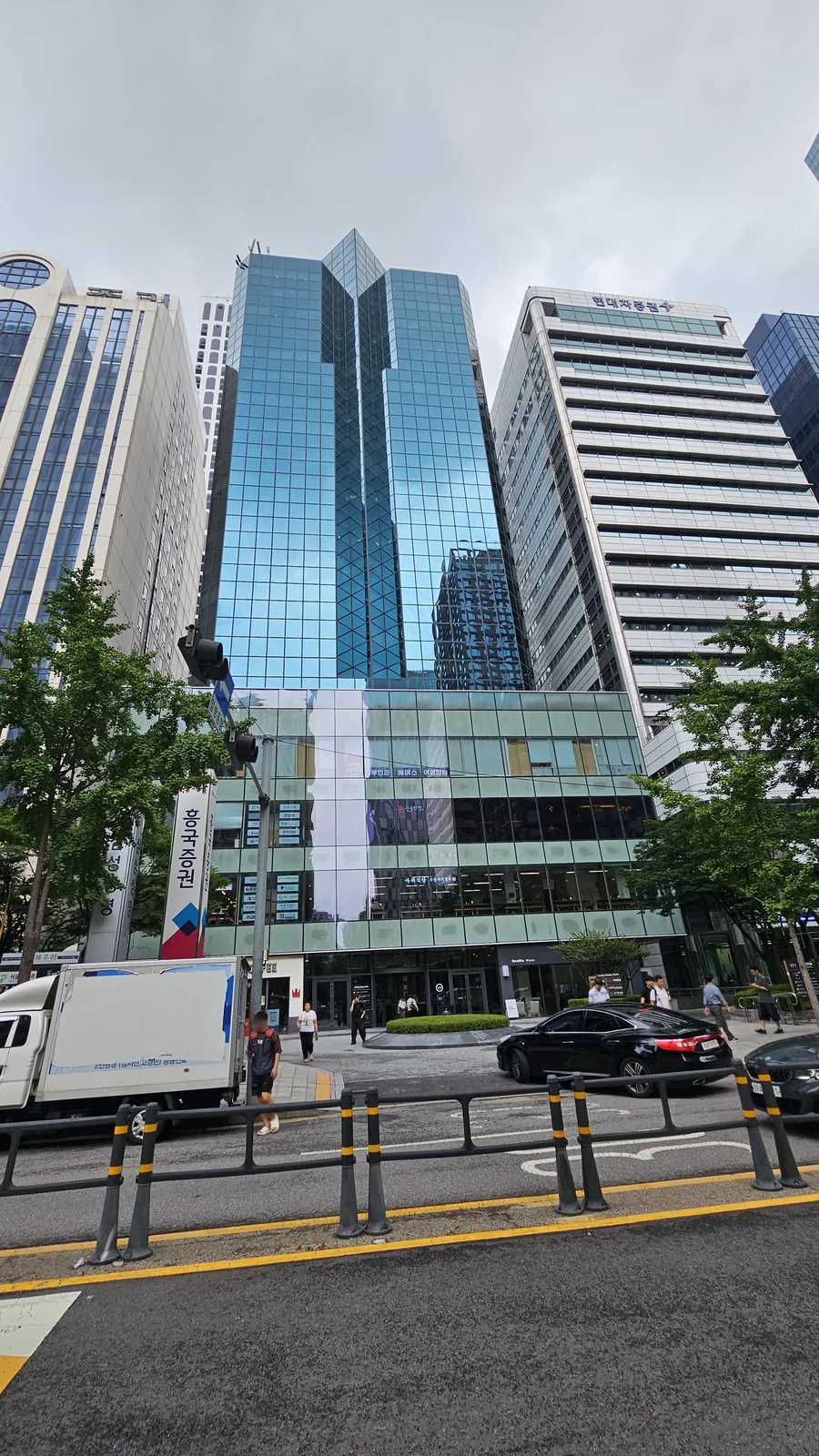 Yeouido Gukjegeumyungno street view with glass high-rise office towers in Seoul's financial district