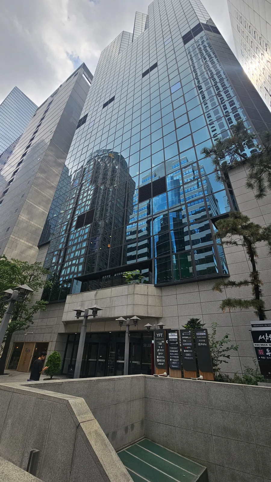 Exterior glass facade of Yeouido Finance Tower high-rise office building in Seoul