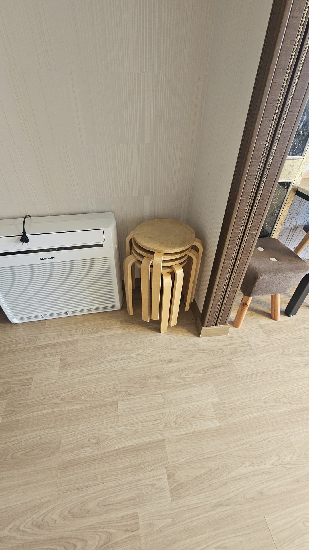 Samsung air conditioner and folding chair inside Vivace Resort Royal Suite