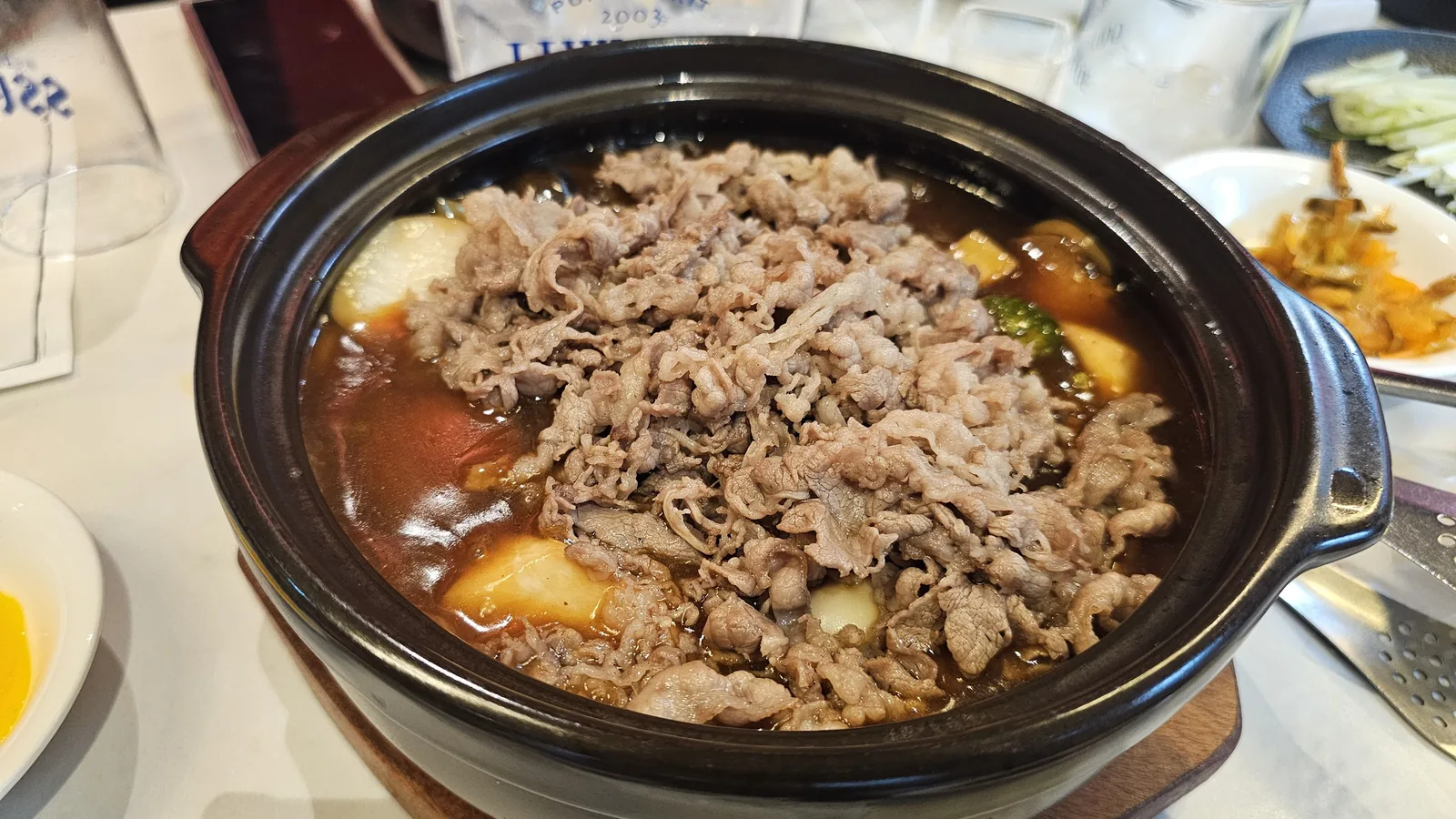 Mapo tofu hot pot loaded with thinly sliced meat at Xin Hong Lou Yeouido