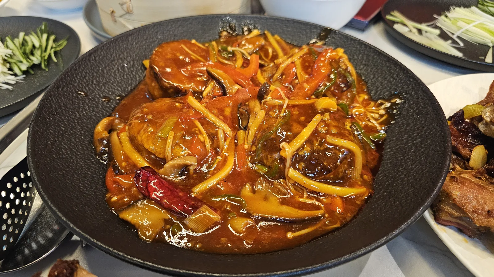 Fish-fragrant eggplant (yuxiang qiezi) in rich dark Sichuan sauce at Xin Hong Lou Yeouido