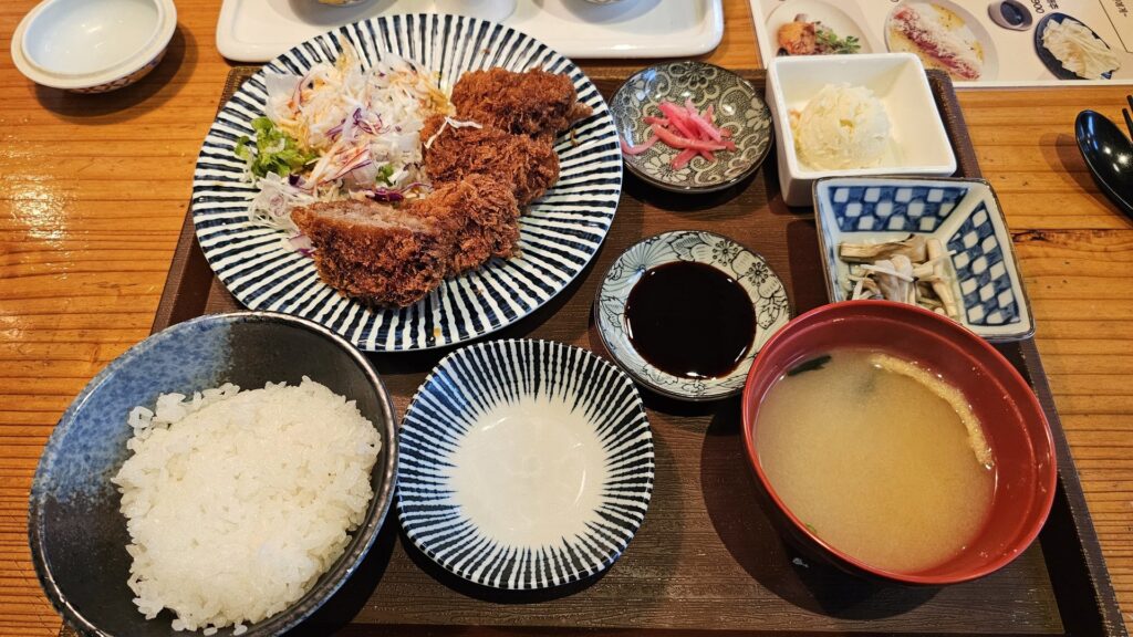 Full Yamaya teishoku lunch set with fried main dish, rice, miso soup, and side dishes on a tray